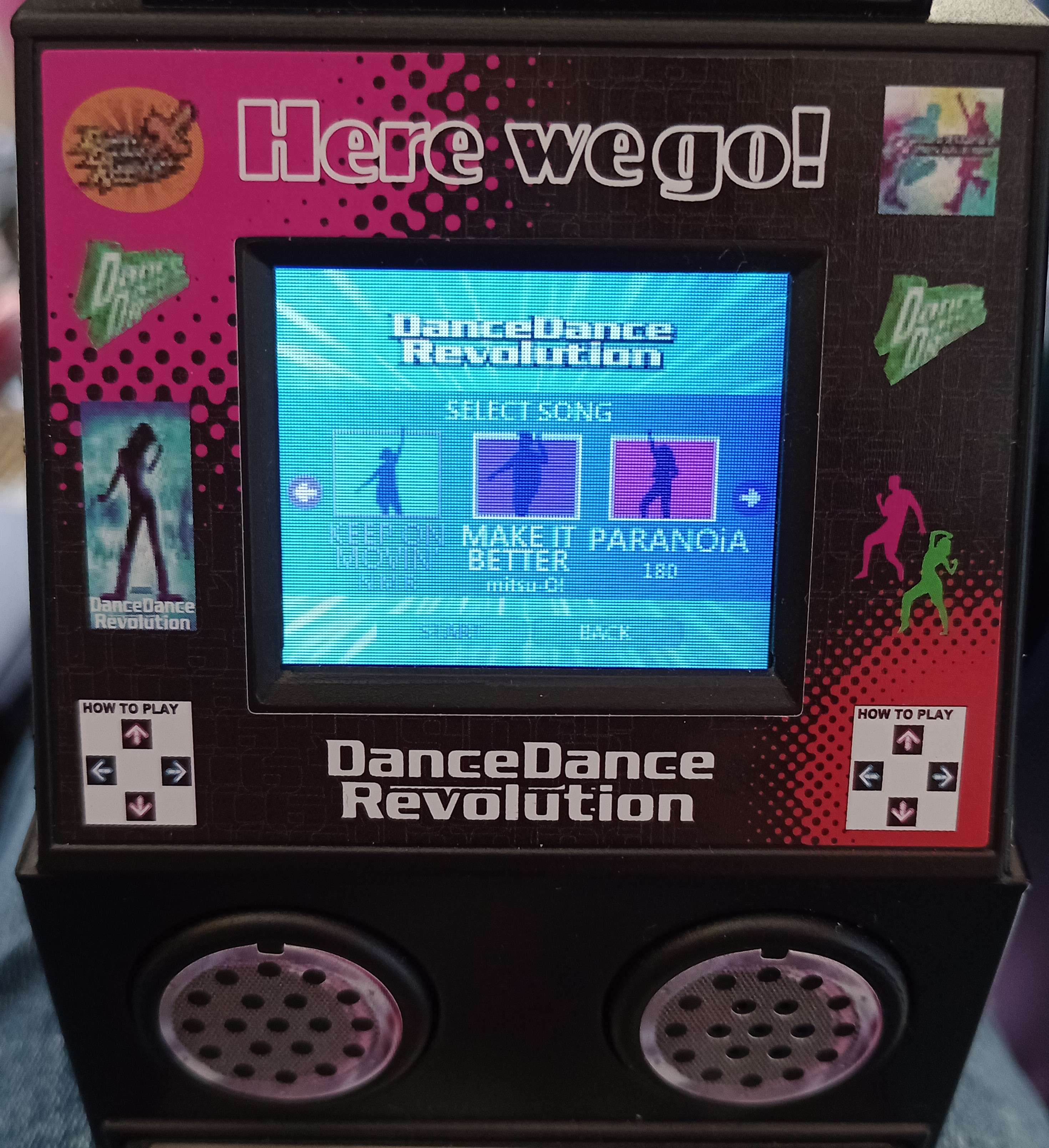 the minicab's screen on the song-select menu, with the ddr x logo visible in the corner of the decals.